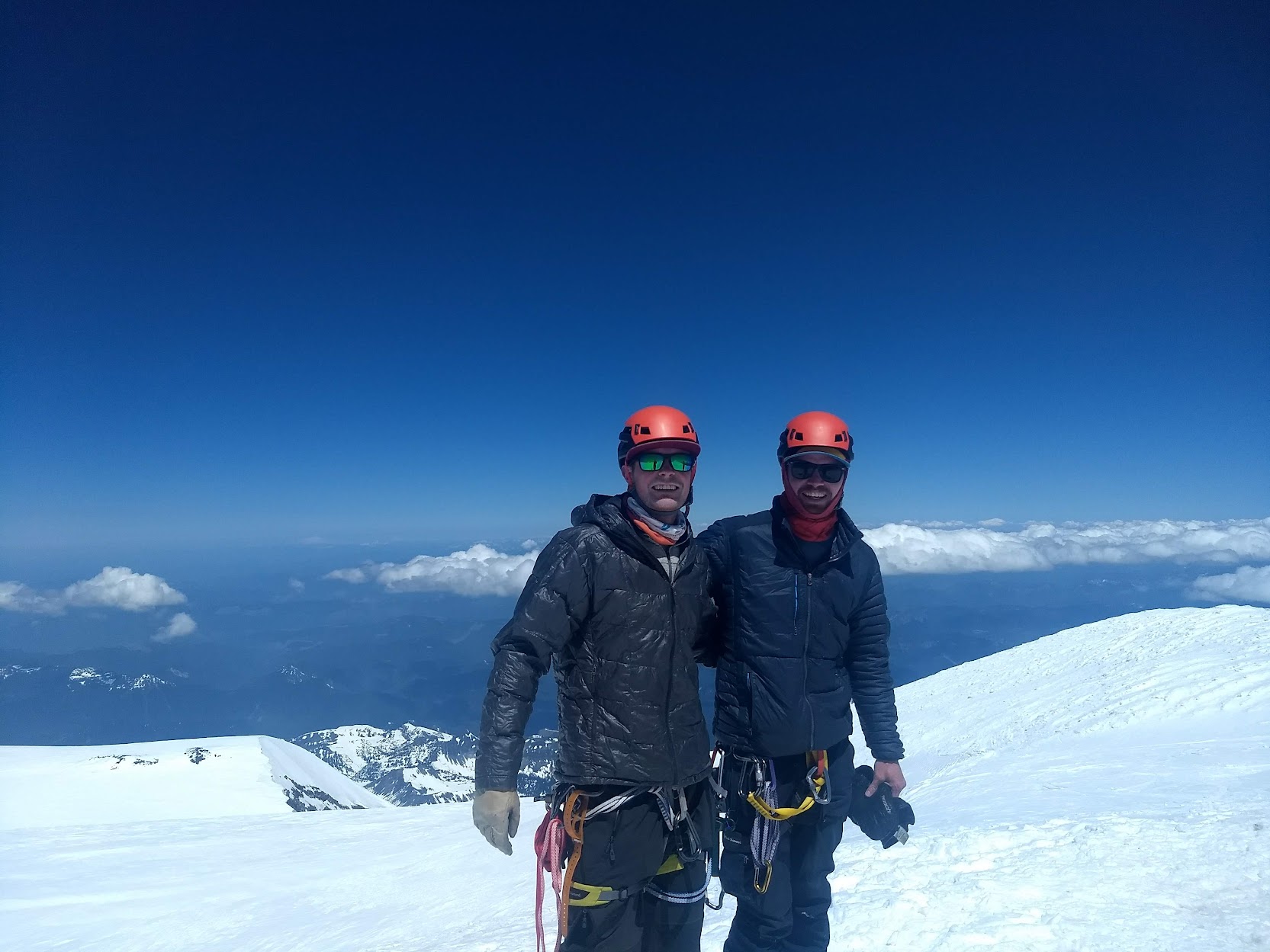 Nevin and friend on the peak of rainer